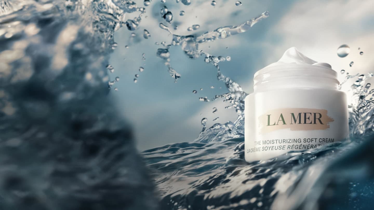 Photograph of the moisturising soft cream on an ocean wave.